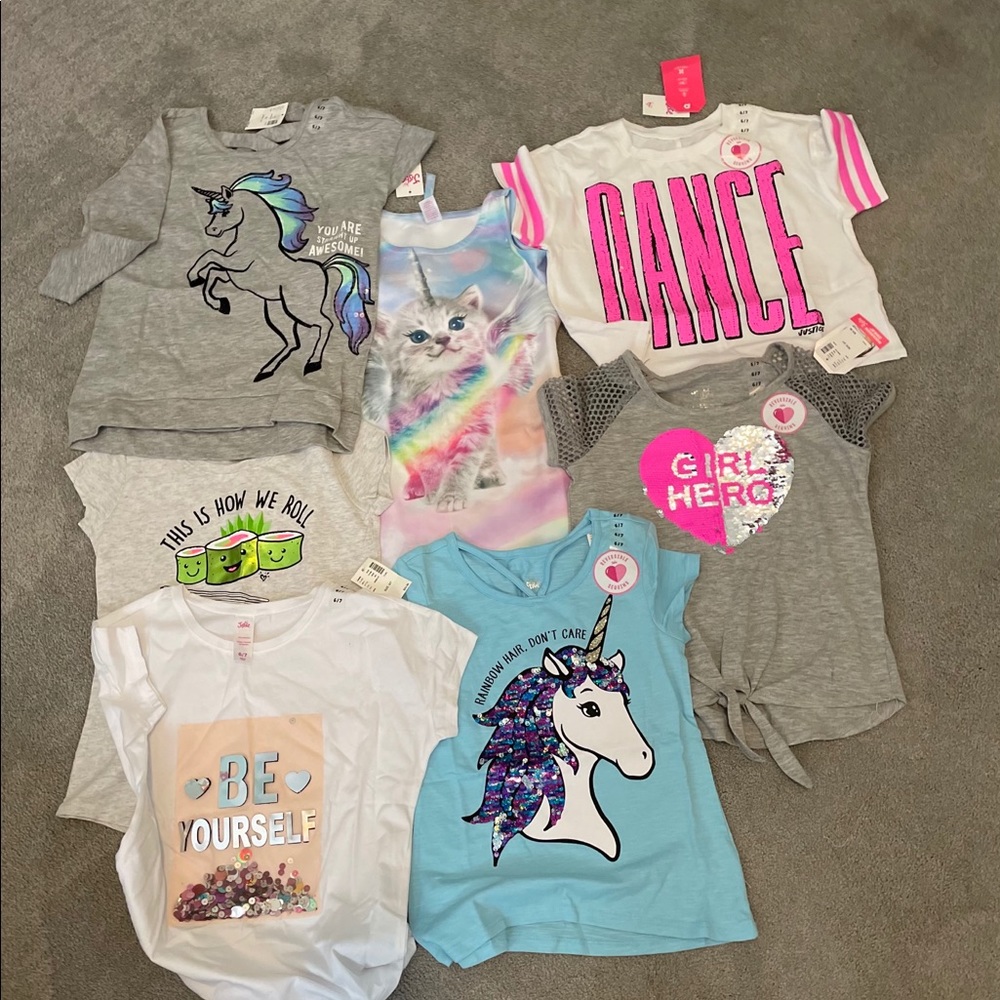 Justice girls lot- NWT. One dress and six shirts.